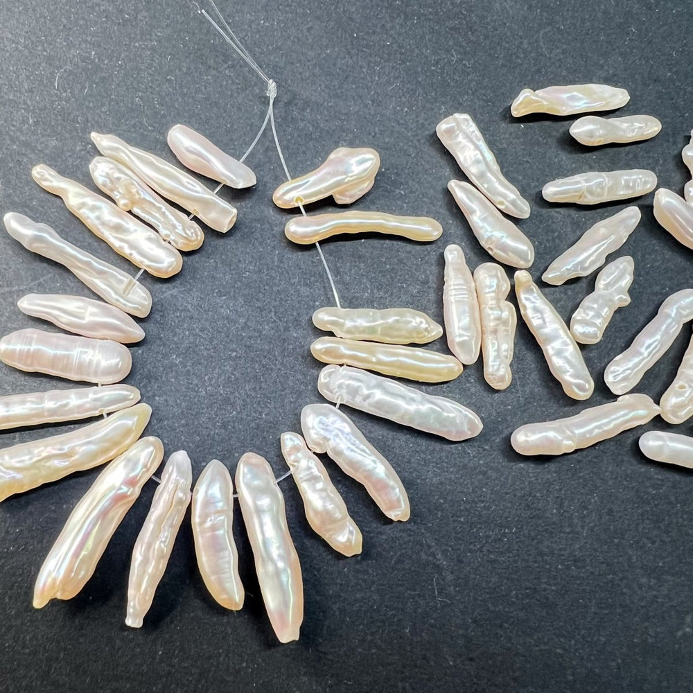 １パック＊２０本入り＊ホワイト＊スティック淡水パール＊端っこ穴＊約10×3～18×3ｍｍ前後 - aoneko_gems