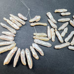 １パック＊２０本入り＊ホワイト＊スティック淡水パール＊端っこ穴＊約10×3～18×3ｍｍ前後 - aoneko_gems