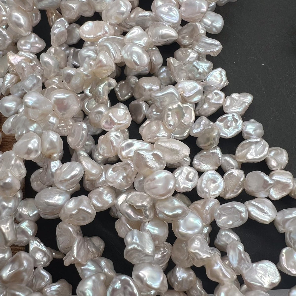 1/2連*高品質♪ツヤツヤ*ケシ型クレオパトラ＊淡水パール*約7.5ｍｍ前後 - aoneko_gems