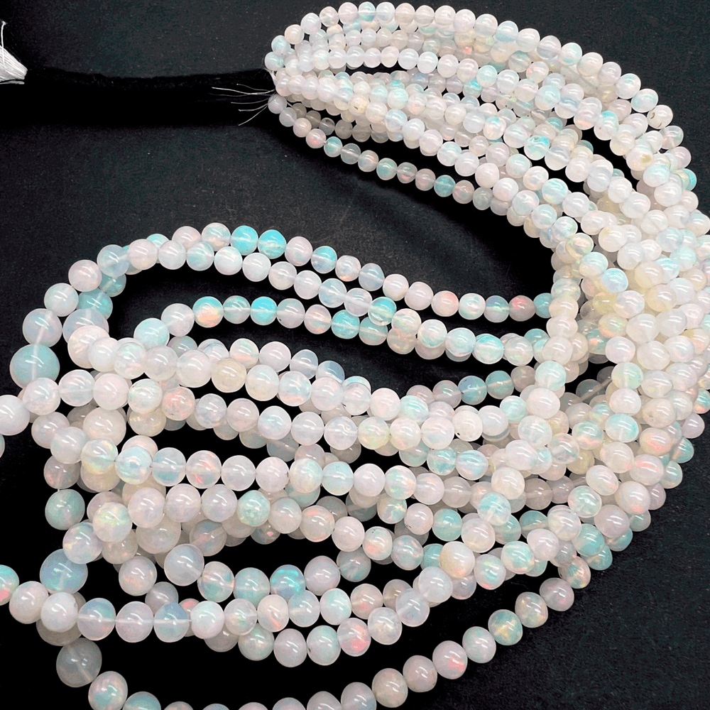 1/4連*透明＆ミルキー*エチオピアオパール*丸玉連*約３～７ｍｍ前後 - aoneko_gems