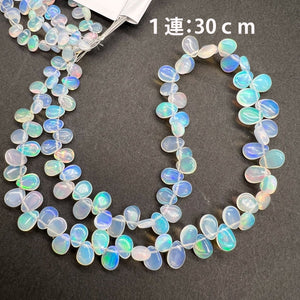 1/4連*ホワイト*エチオピアオパール*スムースペアシェイプ連*約5×4～9×5ｍｍ前後 - aoneko_gems
