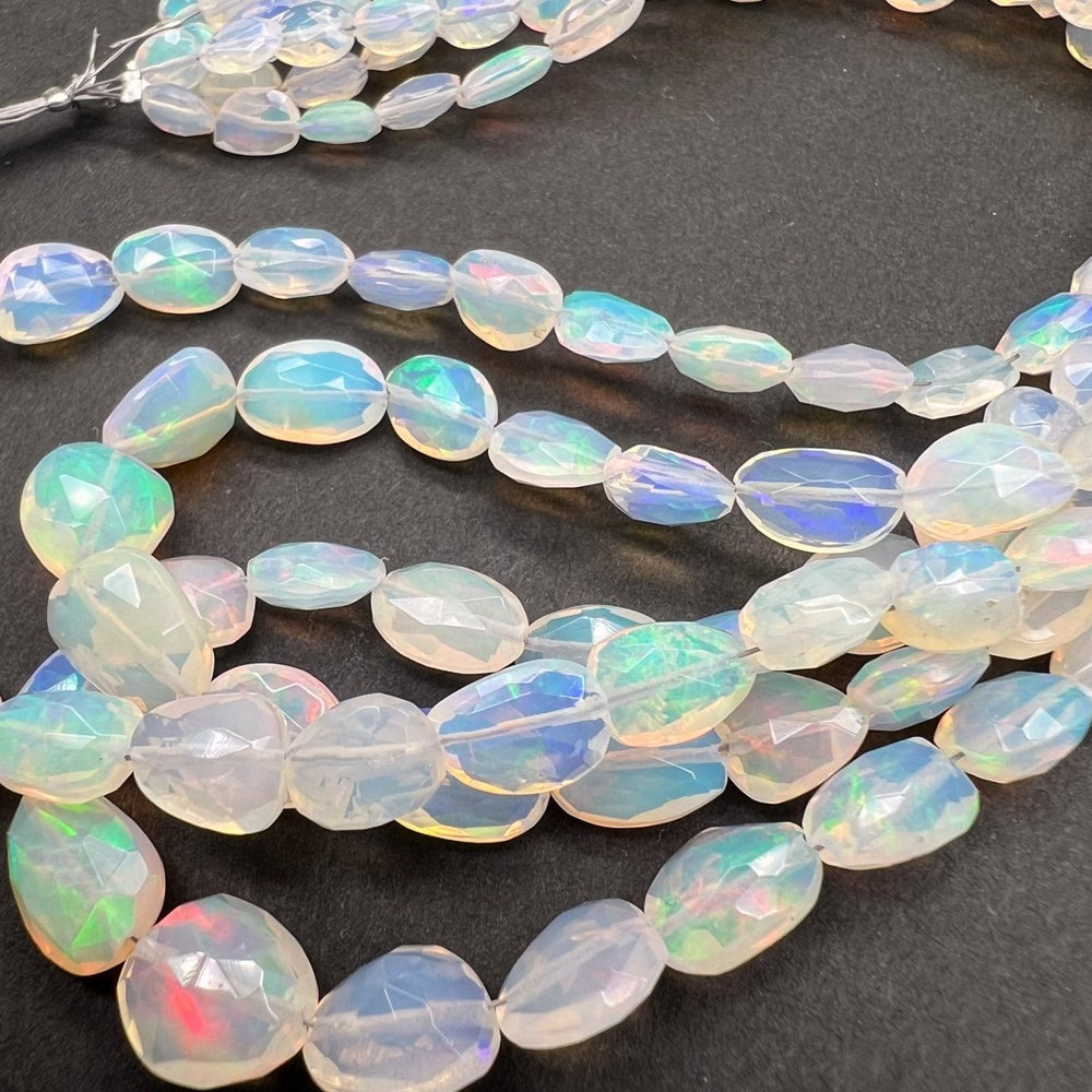 1/4連*エチオピアオパール*大きめオーバルカット連*約6×4.5～8×7.5ｍｍ前後 - aoneko_gems