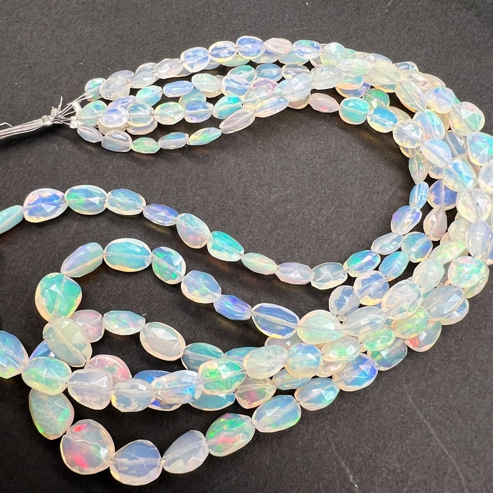 1/4連*エチオピアオパール*大きめオーバルカット連*約6×4.5～8×7.5ｍｍ前後 - aoneko_gems