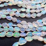1/4連*エチオピアオパール*大きめオーバルカット連*約6×4.5～8×7.5ｍｍ前後 - aoneko_gems