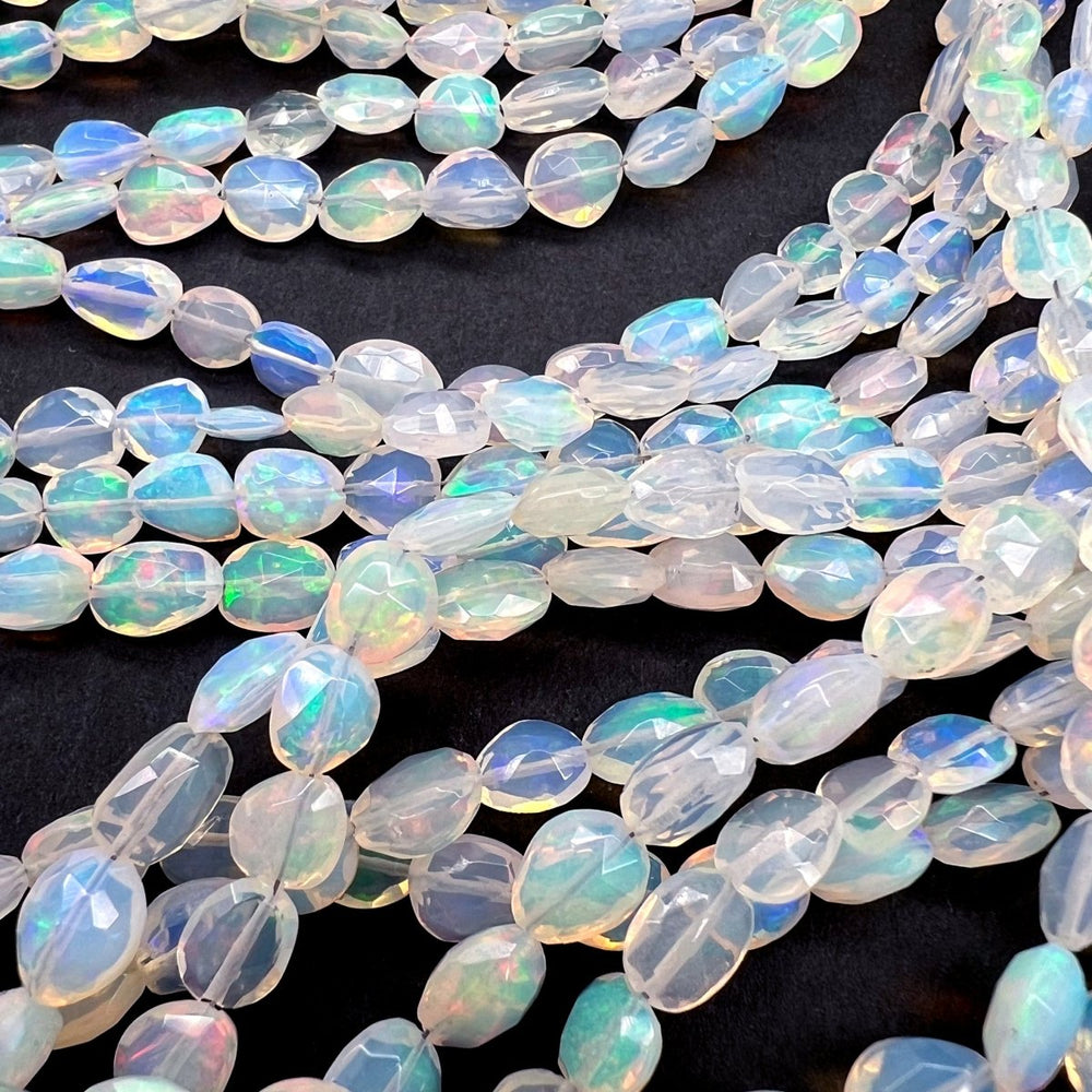 1/4連*エチオピアオパール*大きめオーバルカット連*約6×4.5～8×7.5ｍｍ前後 - aoneko_gems