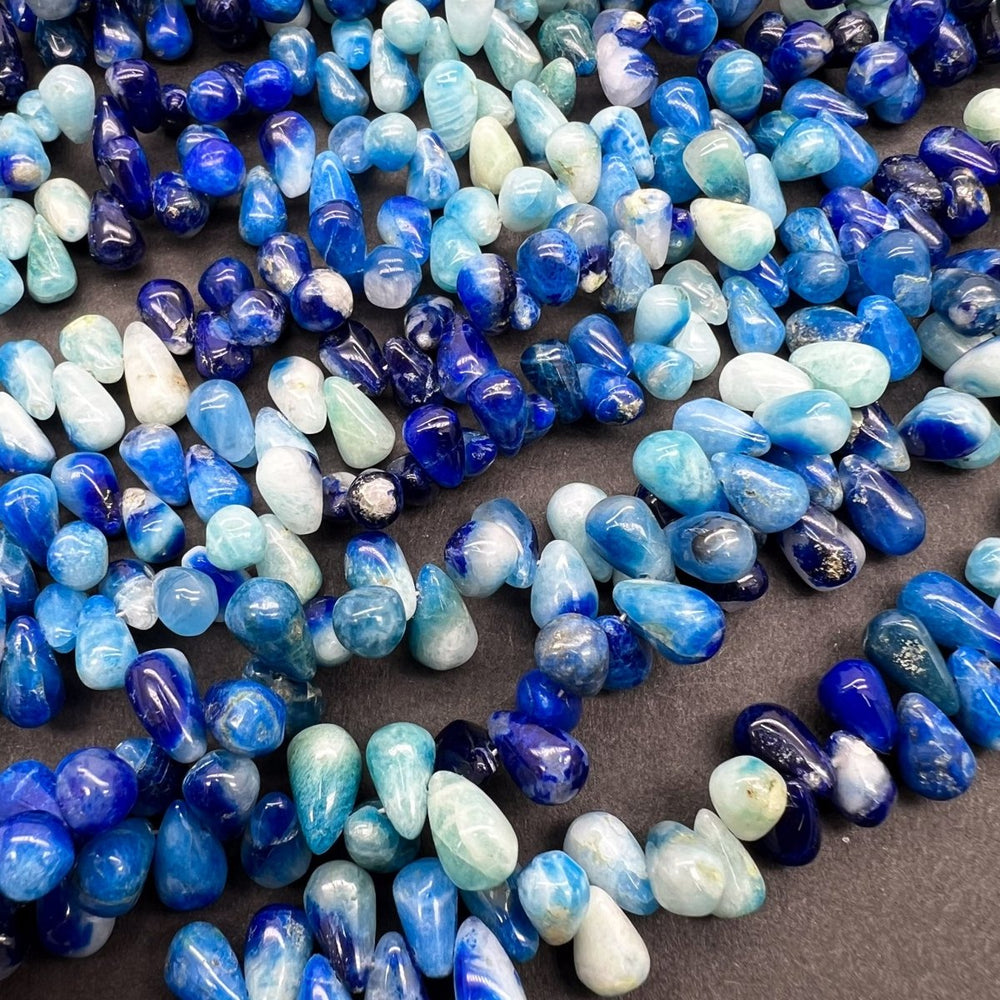 1/6連*UVで光るレア石*アフガナイト*スムースドロップ*約7.5×4ｍｍ前後 - aoneko_gems