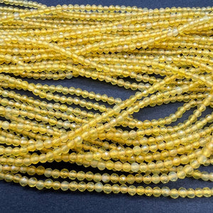イエローアゲート（染め）*ラウンドカット*約2.4ｍｍ - aoneko_gems